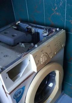 洗衣机滚筒拆卸指南（轻松拆卸洗衣机滚筒）